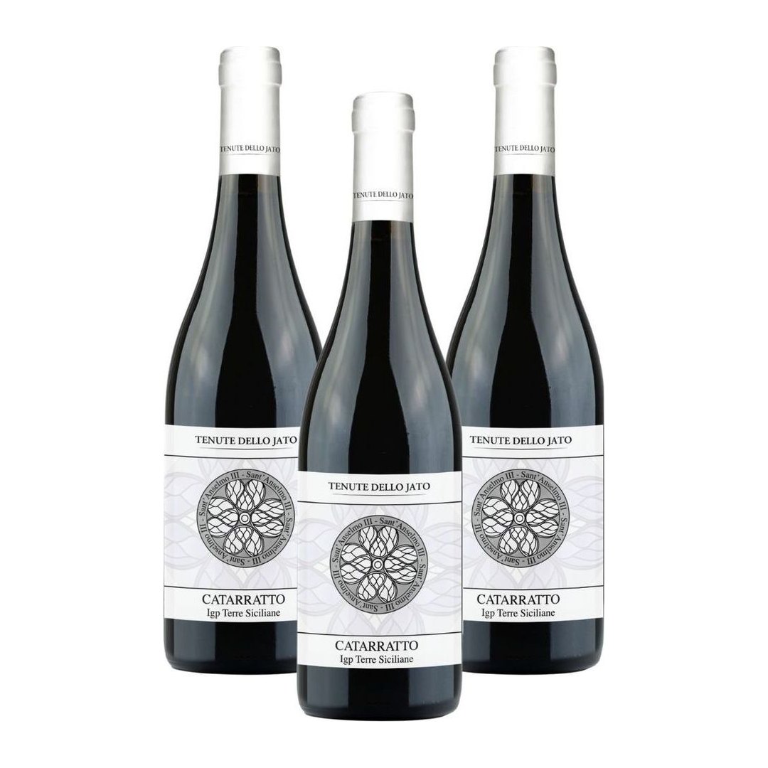 Sant'Anselmo Catarratto IGT: tre bottiglie di vino bianco siciliano con etichetta Tenute dello Jato, colore giallo